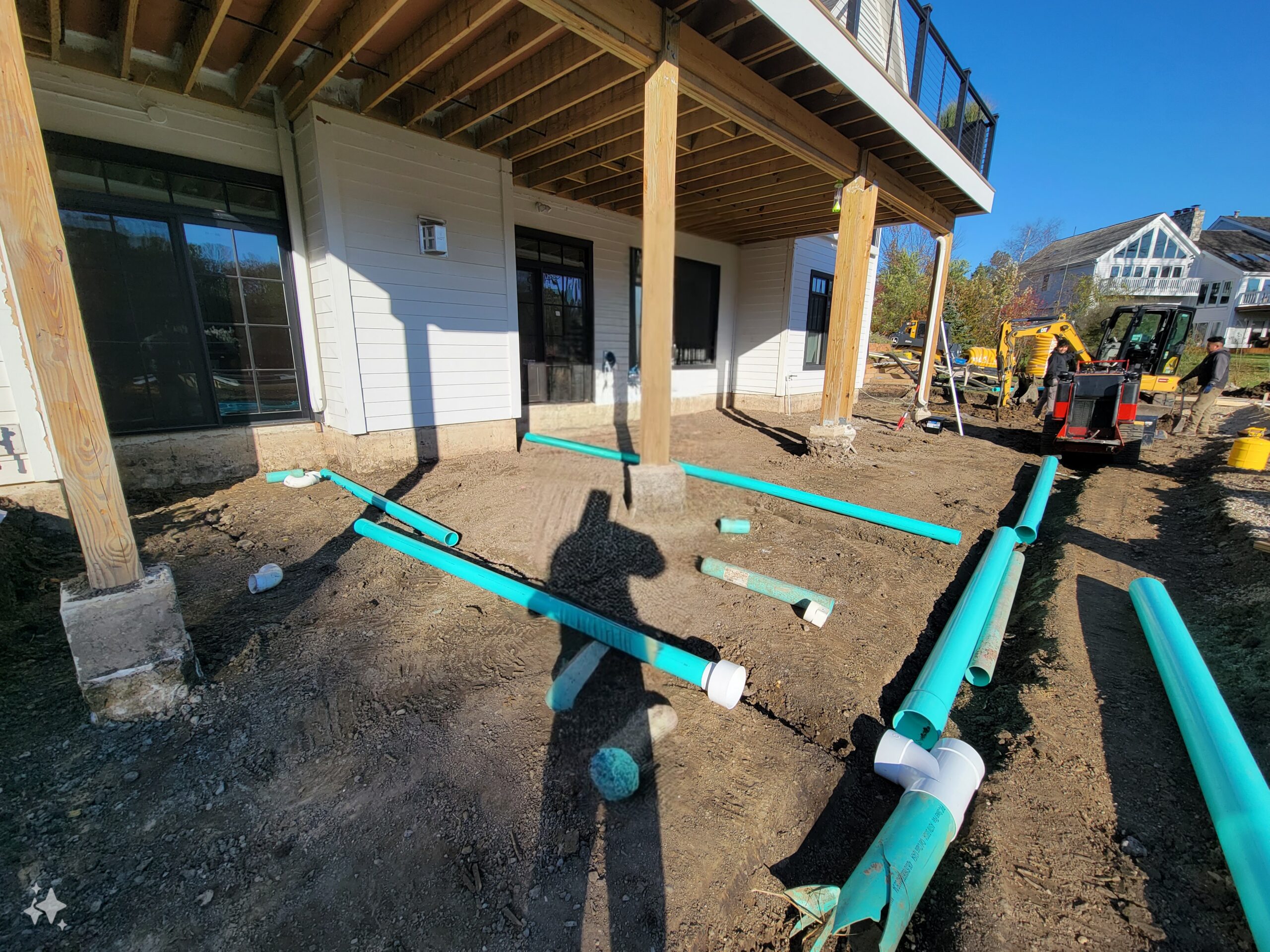 R&R Landscaping crew installing irrigation and drainage lines on a Dallas property